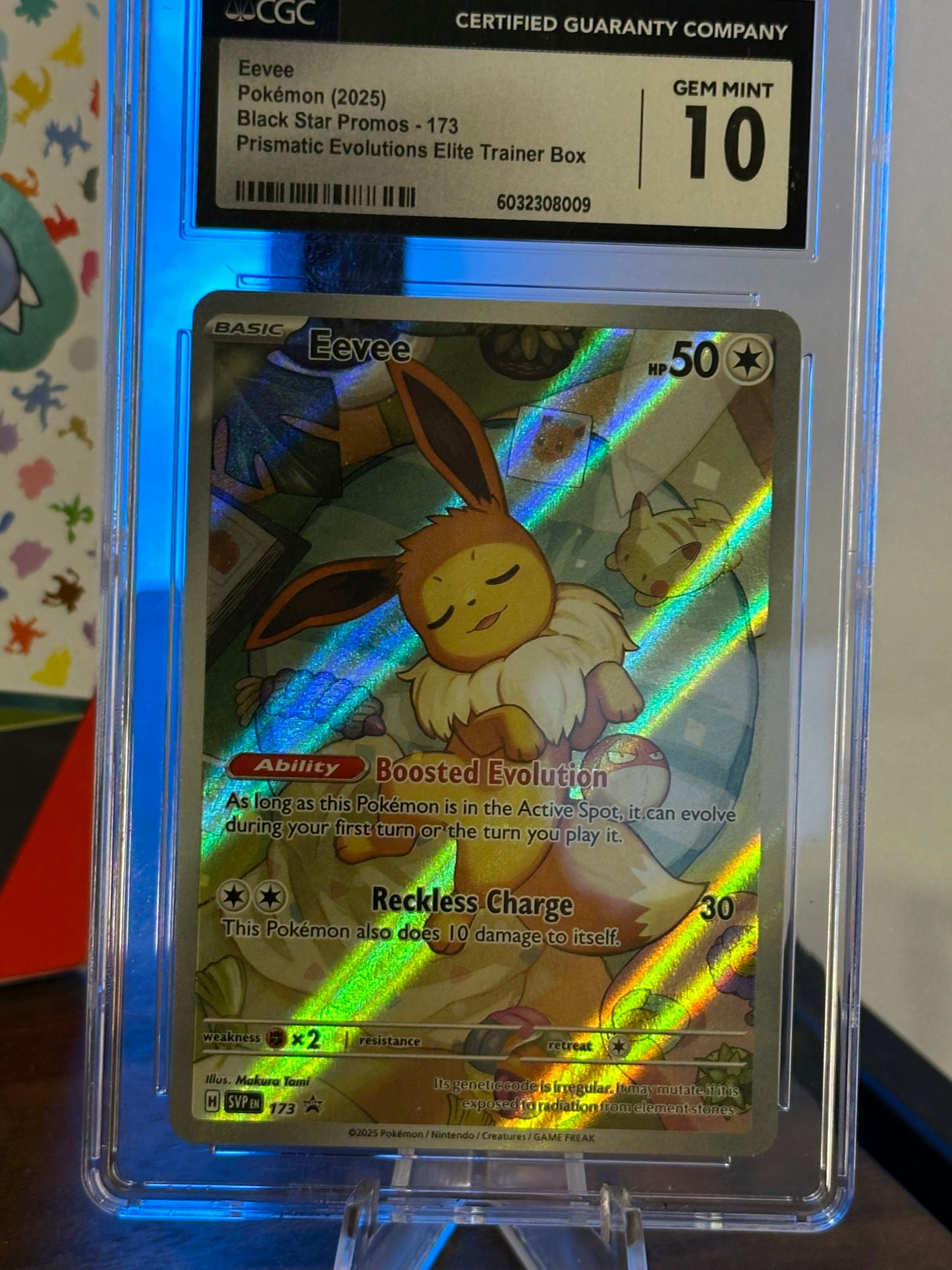 Eevee | Pokémon (2025) | Black Star Promos - 173 | Prismatic Evolutions Elite Trainer Box | CGC GEM MINT 10